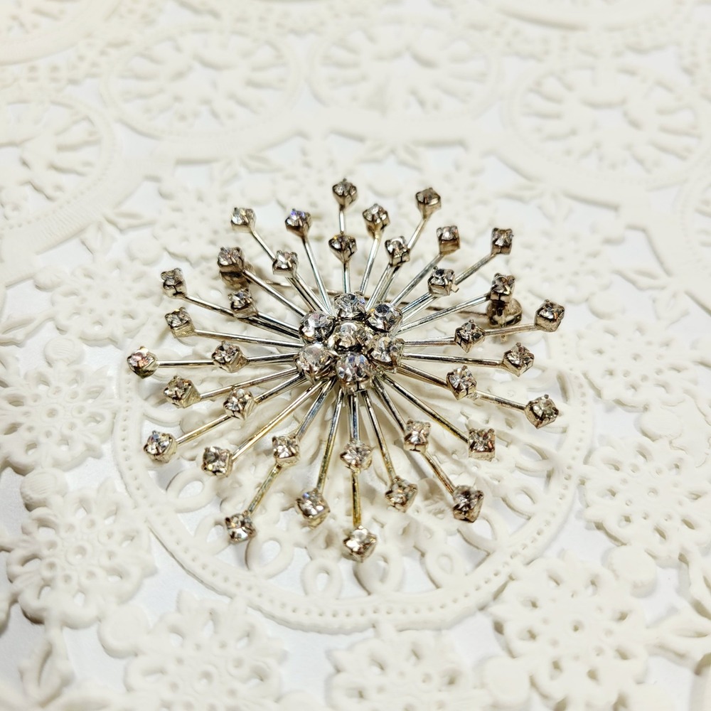Vintage Roman RMN Signed Atomic Starburst Rhinestone Brooch Silver Tone